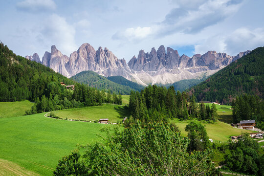 Dolomite mountains and lush valley landscape