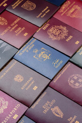 Fototapeta premium Passports of citizens of different countries of the world, passports background