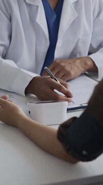  doctor examines a patient during a medical consultation in an office