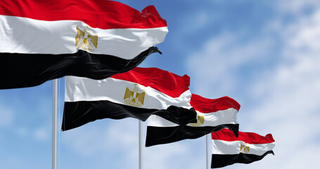 National flags of Egypt waving in the wind on a clear day