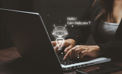 A user typing on a laptop with a glowing AI chatbot icon, symbolizing virtual assistants, automated support, customer service AI, and intelligent digital communication.