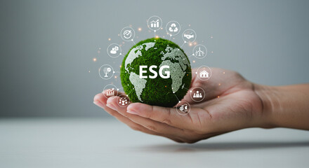 Responsible business growth with sustainable earth icons in hand, ESG concept