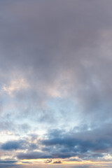 Dramatic Sunset Sky With Heavy Clouds Over Horizon, Moody Cloudscape At Dusk
