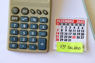 Brazilian 13th salary concept with "13º Salário" text, calendar and calculator. 13º salario Brasileiro. 