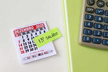 Brazilian 13th salary concept with "13º Salário" text, calendar and calculator. 13º salário Brasileiro. 