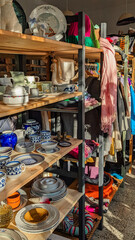 Vintage Thrift Store with Ceramics and Clothing