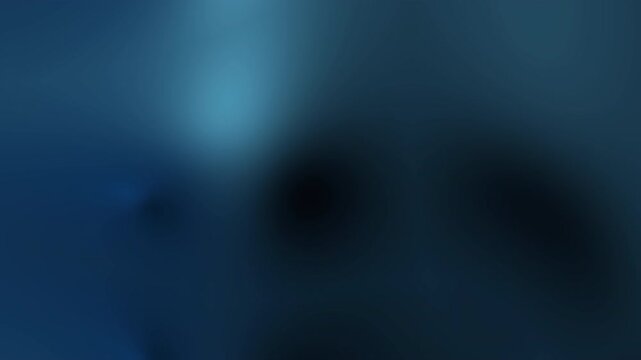 Blurred abstract gradient background in shades of blue. Suitable for elegant design projects, presentations, website backgrounds, and social media posts.