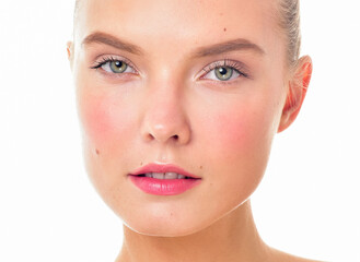 Beautiful face of young adult woman with clean fresh skin. Looking at Camera.