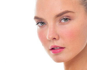 Beautiful face of young adult woman with clean fresh skin. Looking at Camera.