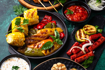 Assortment of grilled bbq meat and vegetables