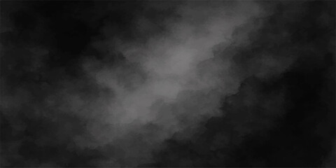 Abstract dark smoke texture on a black background like night fog or clouds with a hint of blue light and motion