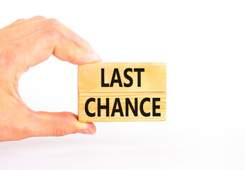 Last chance symbol. Concept word Last chance on beautiful wooden blocks. Beautiful white paper...