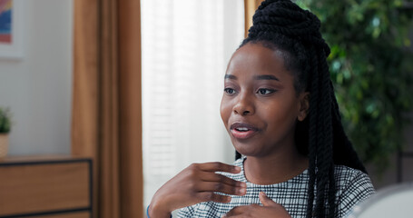 Young woman creates content for social media, recording makeup tips for teenage girls, close-up...