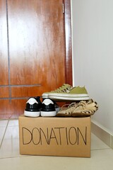 Cardboard box for donation. Charity concept. Donation box. 