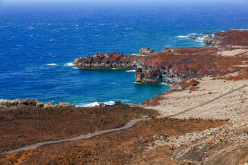 Volcanic landscape near Orchilla lighthouse on the southwest coast of the El Hierro island, Canary Archipelago, Spain, Europe	
