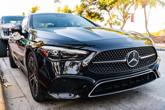 Miami, Florida, USA - April 08, 2025: Black car, low corner view. 2024 Mercedes Benz CLE 300 coupe car. Luxurious coupe Mercedes Benz 300 4MATIC. Car Mercedes Benz 300 parked outdoor
