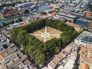 Fototapeta premium Bristol UK: 28th Jul 2025: Drone view of Bristol Queen Square. Prepares for an exciting event with setup taking place in the heart of the city