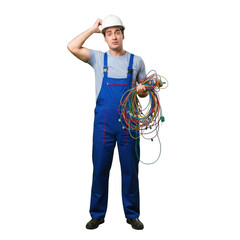 Confused electrician wearing blue overalls and white hard hat holding tangled wires isolated on transparent background