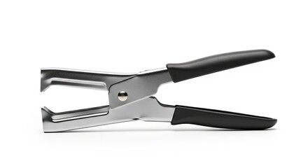 Fototapeta premium Sleek metal and black handheld hole puncher on white background.