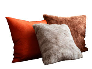 Three Textured Cushions on a Sofa