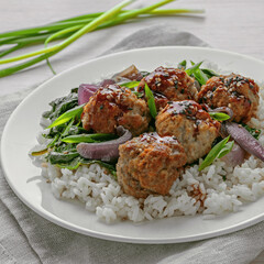 Healthy Meatball Dinner Plate with Greens and Sesame Seeds