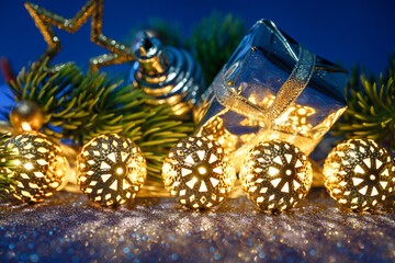 Golden lights enhance celebration atmosphere, Warm illumination creates cozy holiday party setting