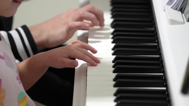 Melody maker afternoon duet little girl and man playing piano together, perfecting skills and sharing beautiful music