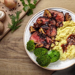 Juicy Beef Steak with Mushroom Sauce and Potato Mash