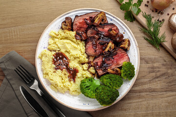 Overhead View of Steak, Mashed Potatoes, and Broccoli Dinner