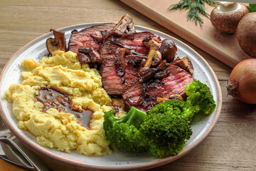 Juicy Beef Steak with Mushroom Sauce and Potato Mash