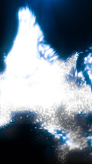 Abstract blue liquid-like burst of glowing light with bright reflections and soft blurred motion