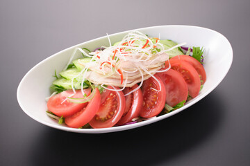 Chinese salad with tomatoes and cucumbers