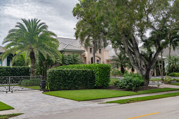 Well-Maintained Florida Home Exterior with  Driveway