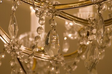 old historical crystal ceiling light in a palace