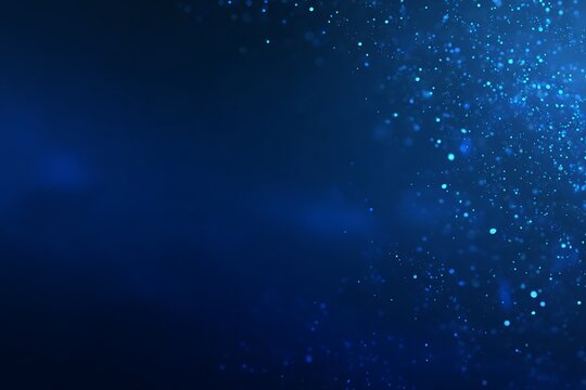 A mesmerizing abstract background featuring a dynamic cascade of glowing blue particles and bokeh lights, creating a serene and futuristic atmosphere.