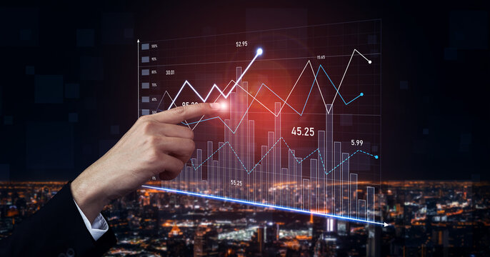A hand points at a glowing financial graph overlay, capturing the essence of data analysis and market trends against a vibrant city skyline at night. Scalp - Powered by Adobe