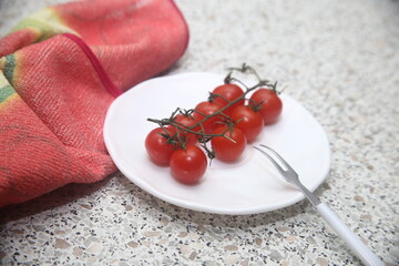 cherry tomatoes on a wooden table