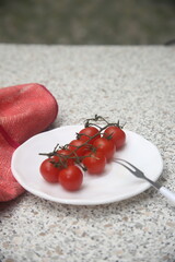 cherry tomatoes on a wooden table