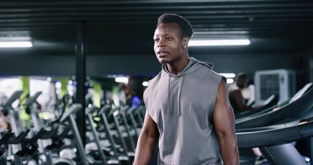 Fitness, weightlifting or man in gym with dumbbell, training or bicep curl in bodybuilding. Exercise, challenge or athlete in club with equipment, intense workout or strength in muscle transformation