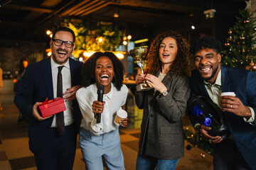Diverse colleagues celebrating success and achievement at office party