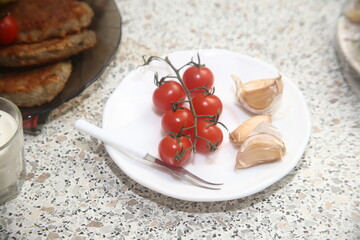 cherry tomatoes on a wooden table