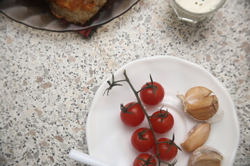 cherry tomatoes in a white bowl