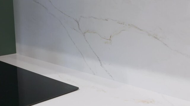 Trendy quartz white stone with luxury marble background texture. Kitchen countertops with modern interior design and counters. 