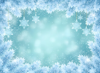 Frosty winter background with icy blue pine branches and delicate snowflake ornaments forming a festive frame. Sparkling snowfall and soft bokeh create a serene seasonal holiday atmosphere