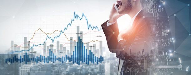 A business professional engages in a phone call while reviewing financial data. The backdrop features dynamic graphs and a city skyline, emphasizing market trends and analysis. Scalp