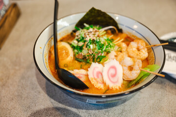 Japanese ramen soup with shrimps, egg, chives and sprout