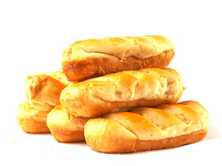Stack of top quality French brioche rolls on white background. Fine gold and soft pastry product. Premium dessert.