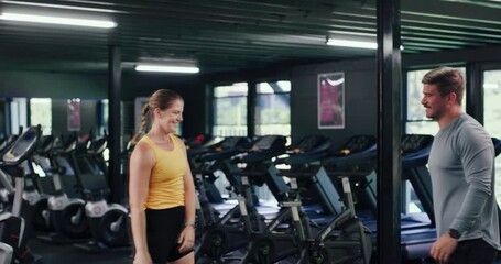 Couple, high five and team in gym for fitness, workout and exercise motivation together. Man, woman and athlete people with success for sports, training and wellness or body goals in health club - Powered by Adobe