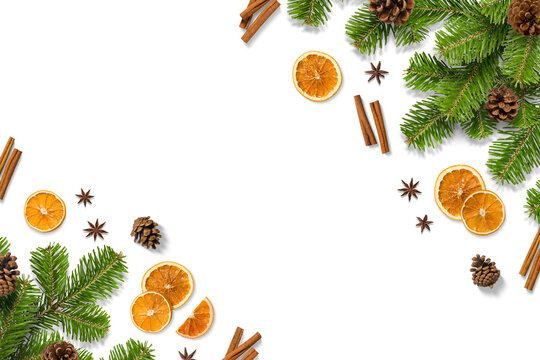 Fototapeta Christmas composition with green fir branches, dried orange slices, cinnamon sticks, anise and pine cones isolated on a transparent background. Perfect for Christmas and winter designs.