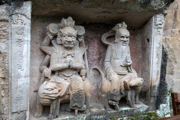 Buddha sculpture located at Dazu Rock Carvings on Mount Baoding, Dazu, China.